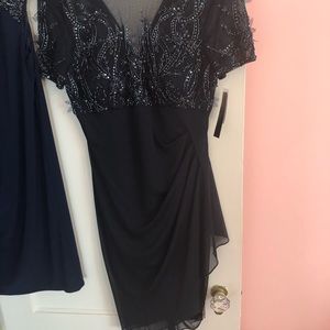 Any nice dress,worn once- or tagged never before.